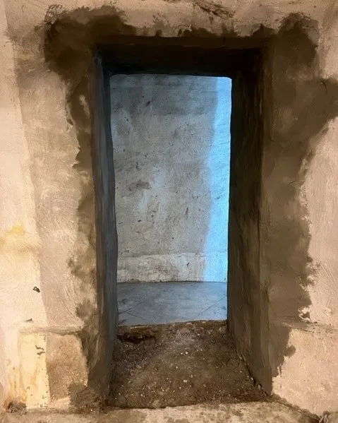 Putsad passage i källare efter håltagning