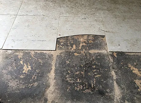 Sanering av asbest i lim och matta